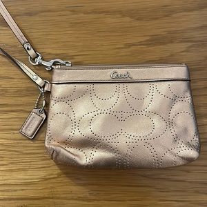Gold shimmer coach metallic wristlet